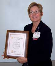 Sharon Ashley with her award